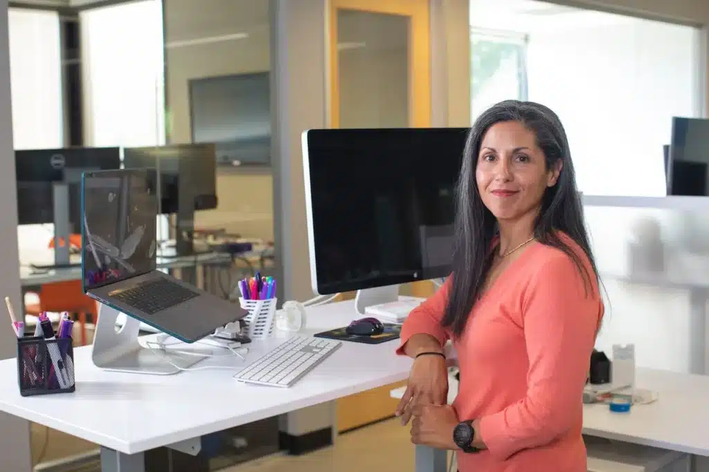 Woman sitting at work desk